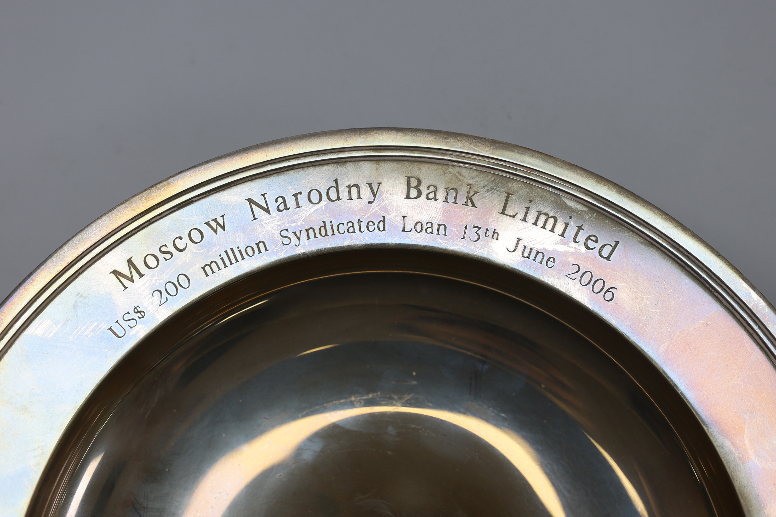 An Elizabeth II silver armada dish, with engraved inscription, J&SM, London, 2005, 25.5cm, 19.8oz.